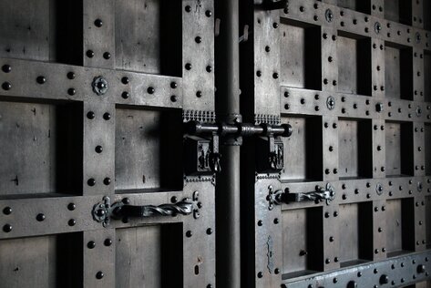 Image of large metal doors with dead bolts