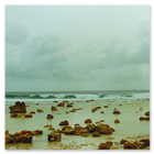 Photo of a ocean side beach on Diego Garcia with the tide out. 1991